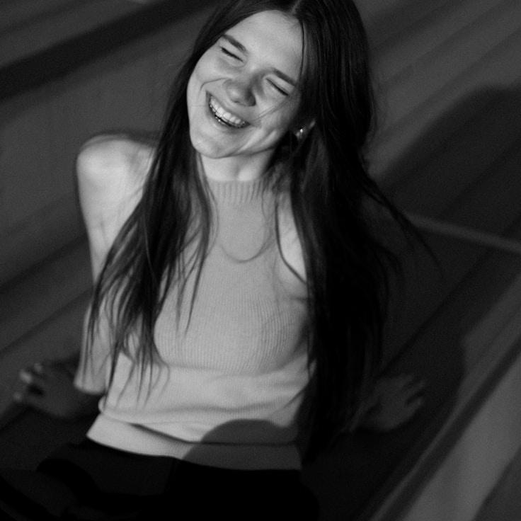 Aarav Singh, Lead Design Curator at GentleWaveCluster, reviewing corporate floral arrangements